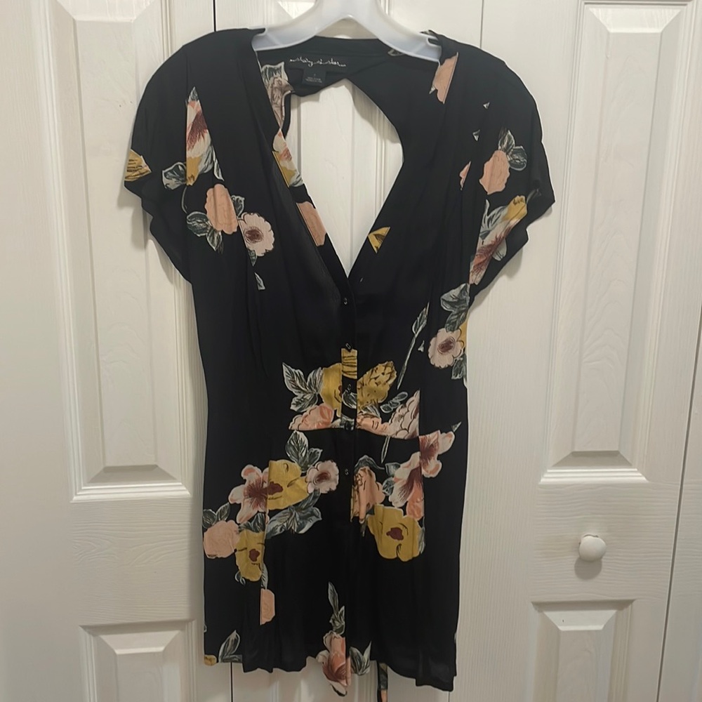 Open back romper never worn